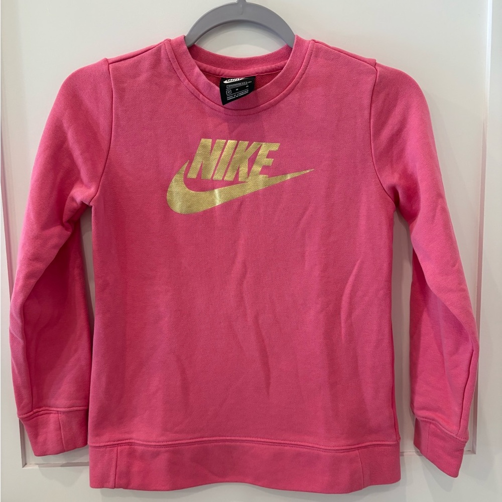 Adorable girls pink Nike Sweatshirt with gold logo